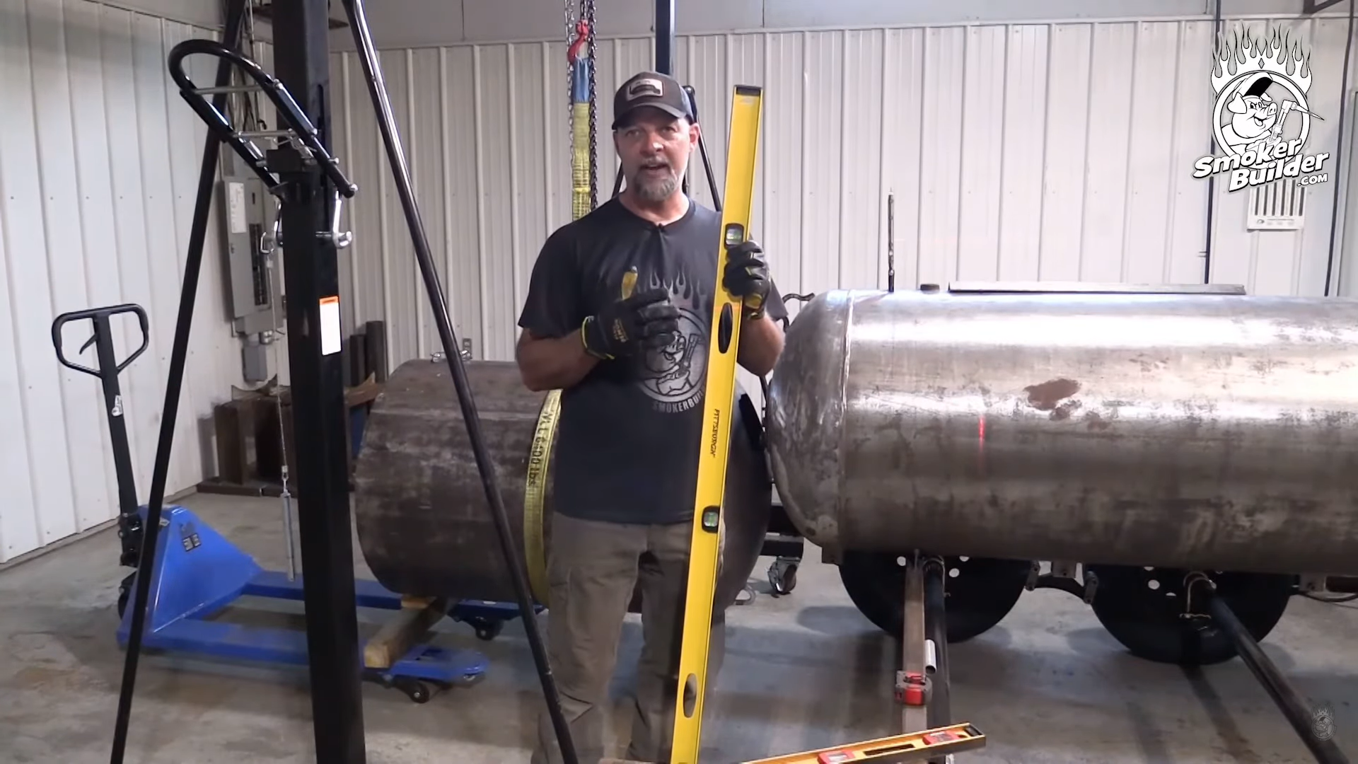 Propane tank sitting on leveled stands in the shop before layout